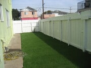 Side yard - 826 E 10th St Apartments