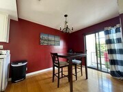 Table off kitchen and entrance to second outdoor space on main level - 231 N Broadway