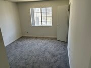 Master bedroom with walk in Closet - 18071 Beneda Ln Apartments Unit 206