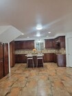 Full Kitchen with island and dinning area - 6161 Oak Crest Way House