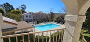 Front porch view of pool - 13020 Wimberly Sq Unit 16