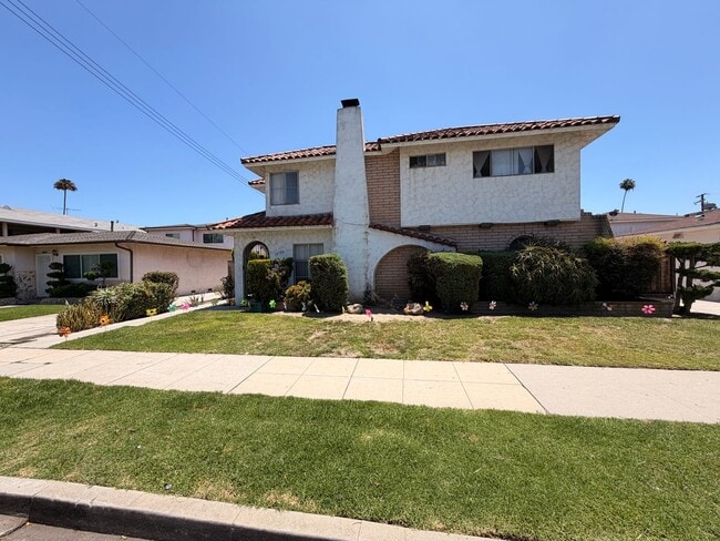 Photo - Completely Remodeled, Spacious 2 Bedroom Apartment For Rent w/ Parking! Unit E