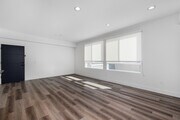 3BR, 2BA - 1,310SF - Living ROom - 857 N Hayworth Ave
