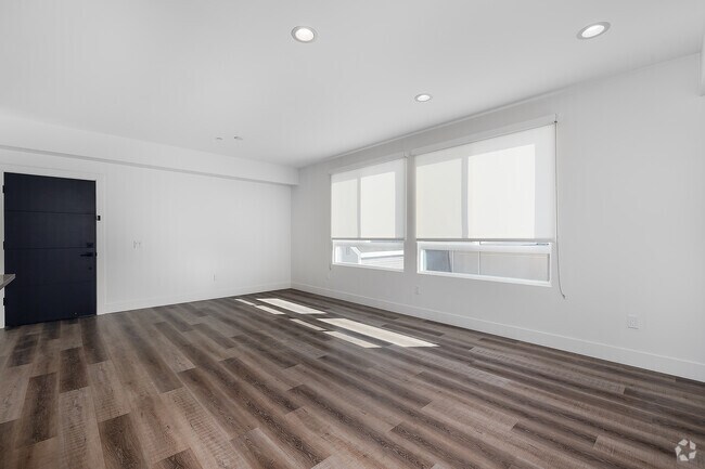 3BR, 2BA - 1,310SF - Living ROom - 857 N Hayworth Ave