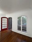 Front entry w/ arched door and French window - 782 E Kensington Rd Apartments Unit 782 E Kensington Rd