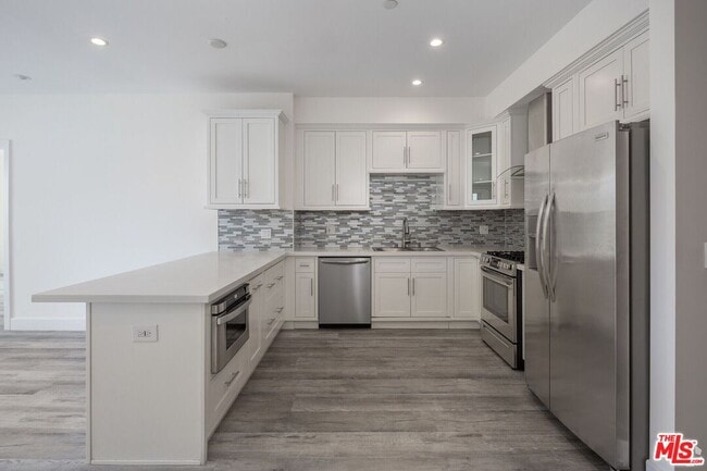 Building Photo - 1237 S Holt Ave Unit 307