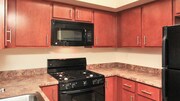 Kitchen with Maple Cabinetry - The Cleo