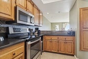Photo - Welcome to this beautiful 1,042 sq. ft. condo offering modern comfort in a prime location! Unit B