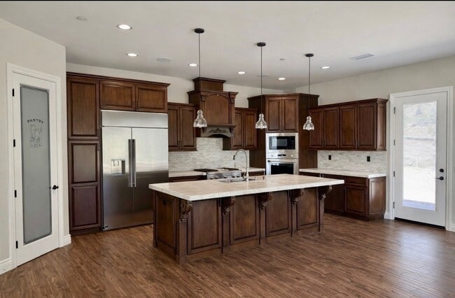 Photo - GORGEOUS HOME 4 BR, 4 1/2 BA, 3 CAR GARAGE & RV PARKING!