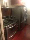 Stove refrigerator and washing machine and dryer - 1861 Pandora Ave Apartments Unit 1