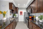 2BR, 2BA - 1038SF - Kitchen - Broadway Palace Apartments