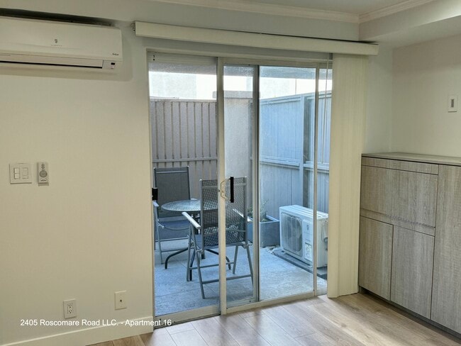 Large Floor to Ceiling Slider to Private Patio - The Roscomare Apartments