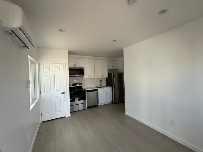 Photo - Eldora, 10313-10321 1/2 Unit 10317 Rear Duplex ADU Left