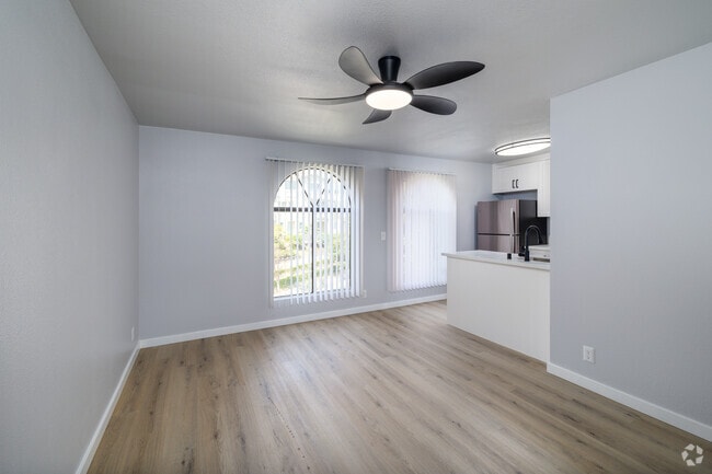 Seagrass - Remodeled Living Room/Dining Room - Salt & Vine Oceanside Apartments