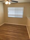 Separate Dining area, with ventian blinds and new flooring. - 9226 Palm St Unit B