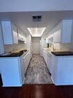Galley Kitchen - 121 S Swall Dr Apartments