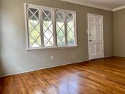 FRONT ROOM - 1738 Carmona Ave Apartments