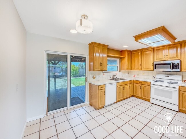 Photo - 2BD/1BA Home in La Mesa with Turf Yards, Large Backyard, W/D & 2-Car Garage