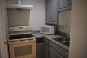 Photo - Charming Two-Bedroom, One-Bath Condo Unit – Avai...