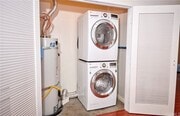 in unit washer and dryer - 435 W Center Street Promenade Condo Unit 216 master bedroom