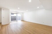 2BR, 3BA - 1232SF - Living Room - Peerless Building Corp.