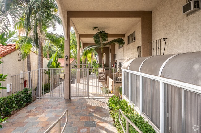Stone paved walkway through property - North Pointe Villas