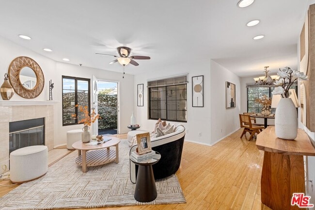 Building Photo - 102 N Sweetzer Ave Unit 106