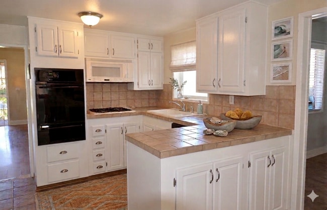 Photo - Great Normal Heights Location! IN UNIT Washer/Dryer, 2 Covered Parking Spots, Storage Locker! Unit 3428 Madison