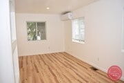 Photo - Charming Two-Bedroom, One-Bath Condo Unit – Avai...