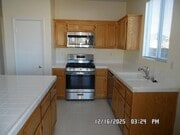 Photo - 4 Bedrooms, 2 Bathrooms, 3 Car Garage, 1899 sq. ft., Large Fenced, Front Yard Lawn, Near Schools ...