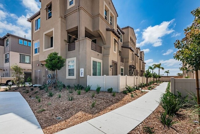 Building Photo - Modern Oceanside Townhome with Resort-Style Amenities