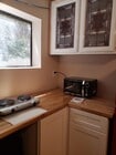 microwave and hot plate - 1432 W 16th St Apartments Unit Studio