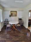 Dining table with 4 chairs, leaf out back. - 3020 E 17th St House