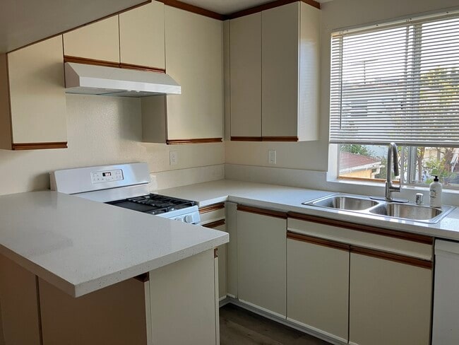 Kitchen Sink and Cabinets - Selby Rose Townhome