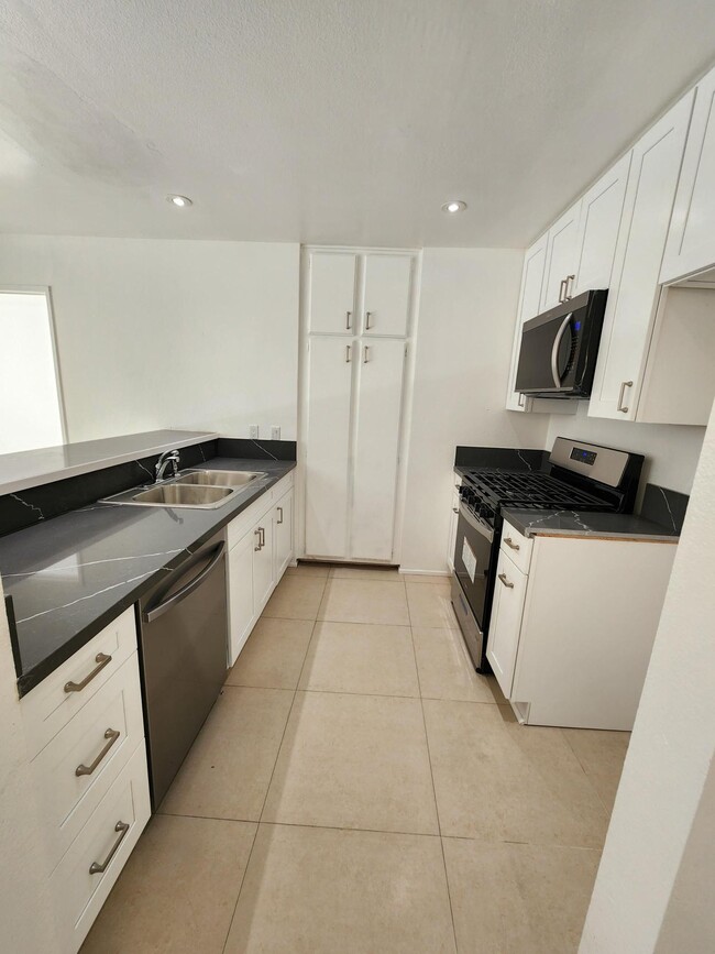 Brand-new appliances and fully remodeled kitchen - 7640 Oso Ave Unit 220
