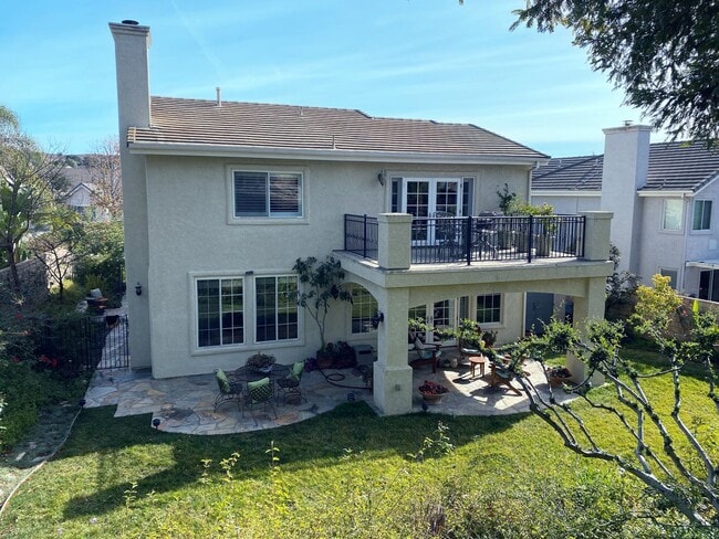 Photo - Private Courtyard Entry & Expansive Backyard Oasis