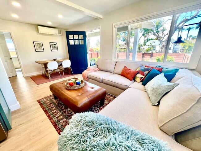 Welcome home to your cozy 9-ft sectional sofa. - 2824 S Orange Dr