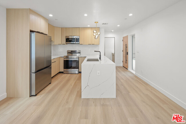 Photo - 11004 Hortense St Condo Unit 1/2