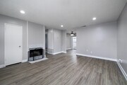 2BR, 1.5BA - 951SF - Living Room - Northwoods