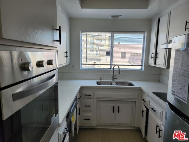 Building Photo - 8531 Alcott St Unit 203 Rental