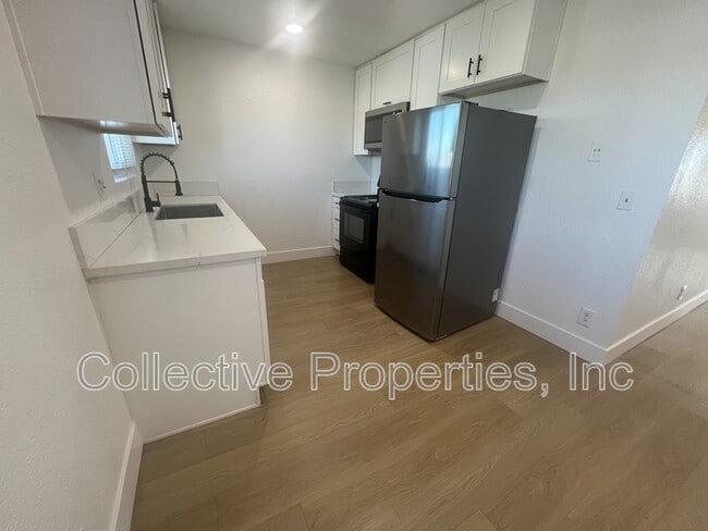 Building Photo - 3965 Logan Ave Unit 3