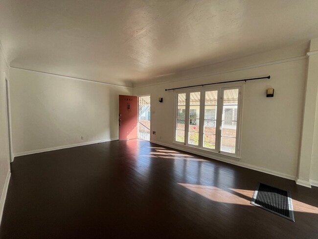 Photo - Lower level 1+1 w/in-unit laundry, assigned parking + water included!