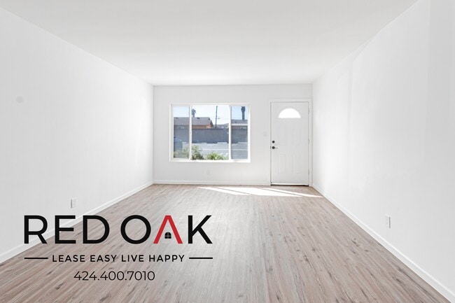 Building Photo - 10015 Alondra Blvd Unit 205