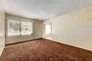 1BR, 1BA - 600SF - Living Room - 12036 S Vermont Ave