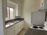 Unit Nº206 - Kitchen Area - 10964 Wellworth Ave Apartments
