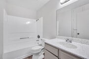 2BR, 2BA - 939SF - 1st Bathroom - Club Royale Apartments