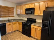 Photo - AFFORDABLE 1st Floor Condo & patio yard!