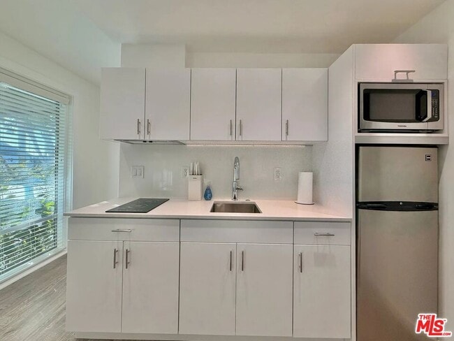 Photo - 5805 W 8th St Unit 100