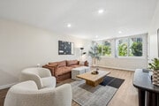 1BR, 1BA - 800SF - Living Room - The Reserve at Warner Center