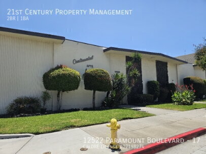 Building Photo - 12522 Paramount Blvd Unit 17